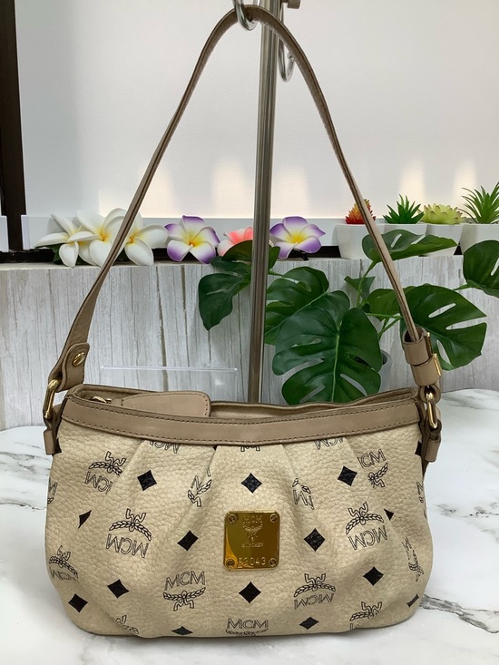 MCM Handbags - MCM Beige Monogram Signature Coated Canvas Shoulder Bag with Gold Plaque